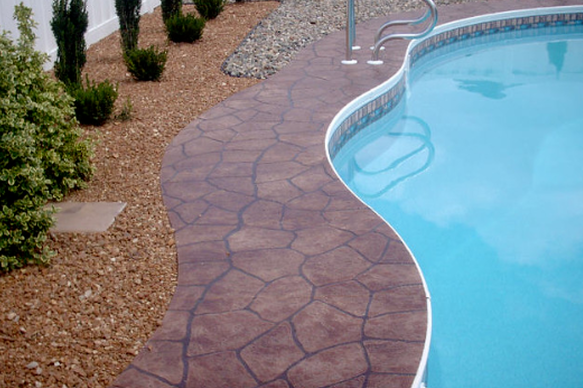 Stamped and stained concrete pool deck Louisville KY